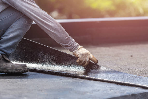 Professional Emergency Waterproofing technician working in Clackamas, OR